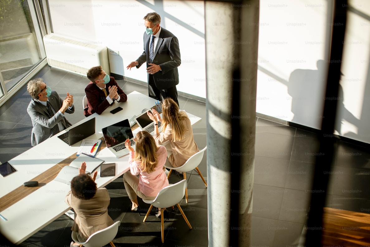 People collaborating around a meeting table